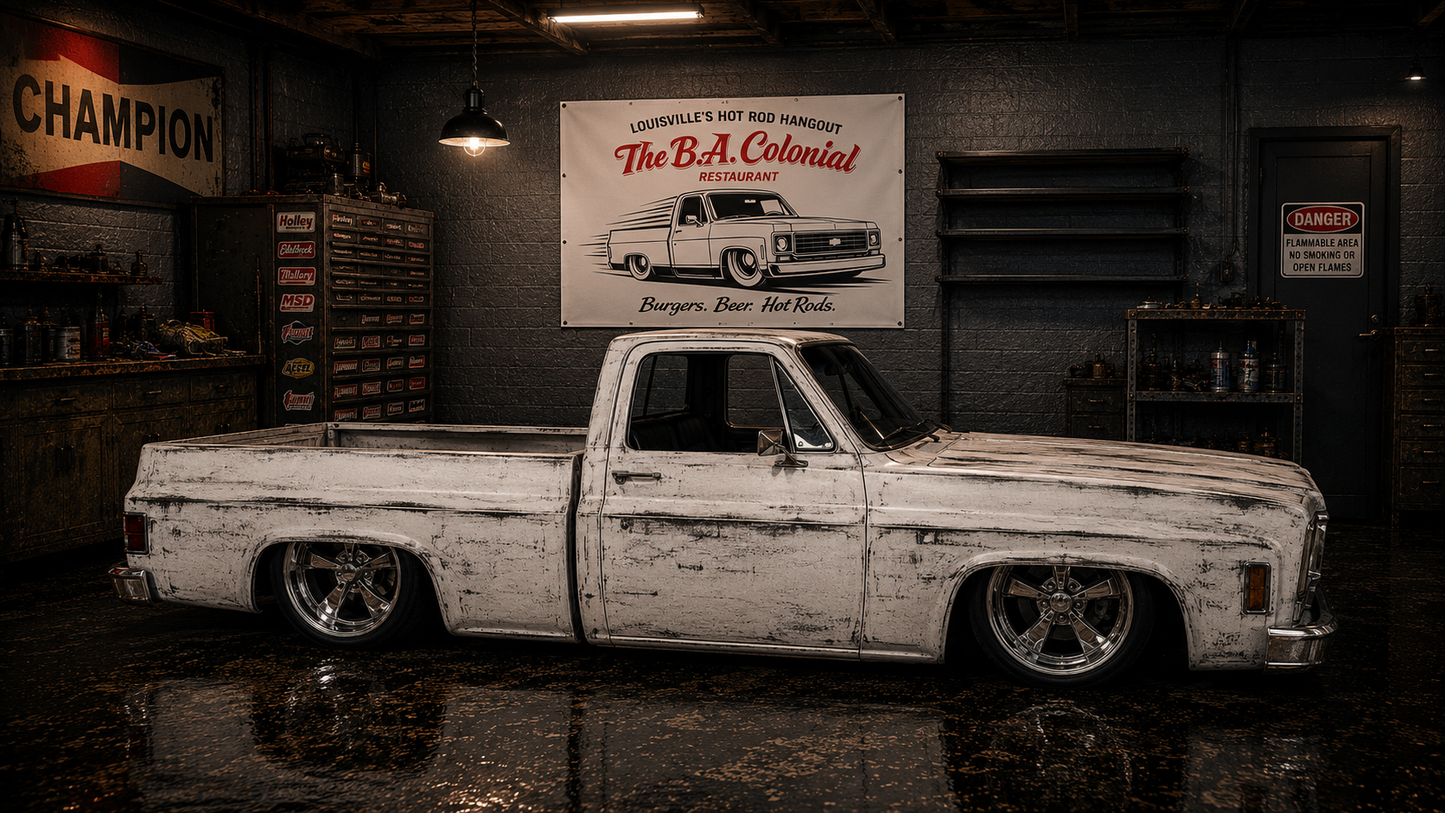 The B.A. Colonial Restaurant vinyl banner hanging on a garage door — Garage Banner collection by Rod Shop Collective — Louisville, Kentucky