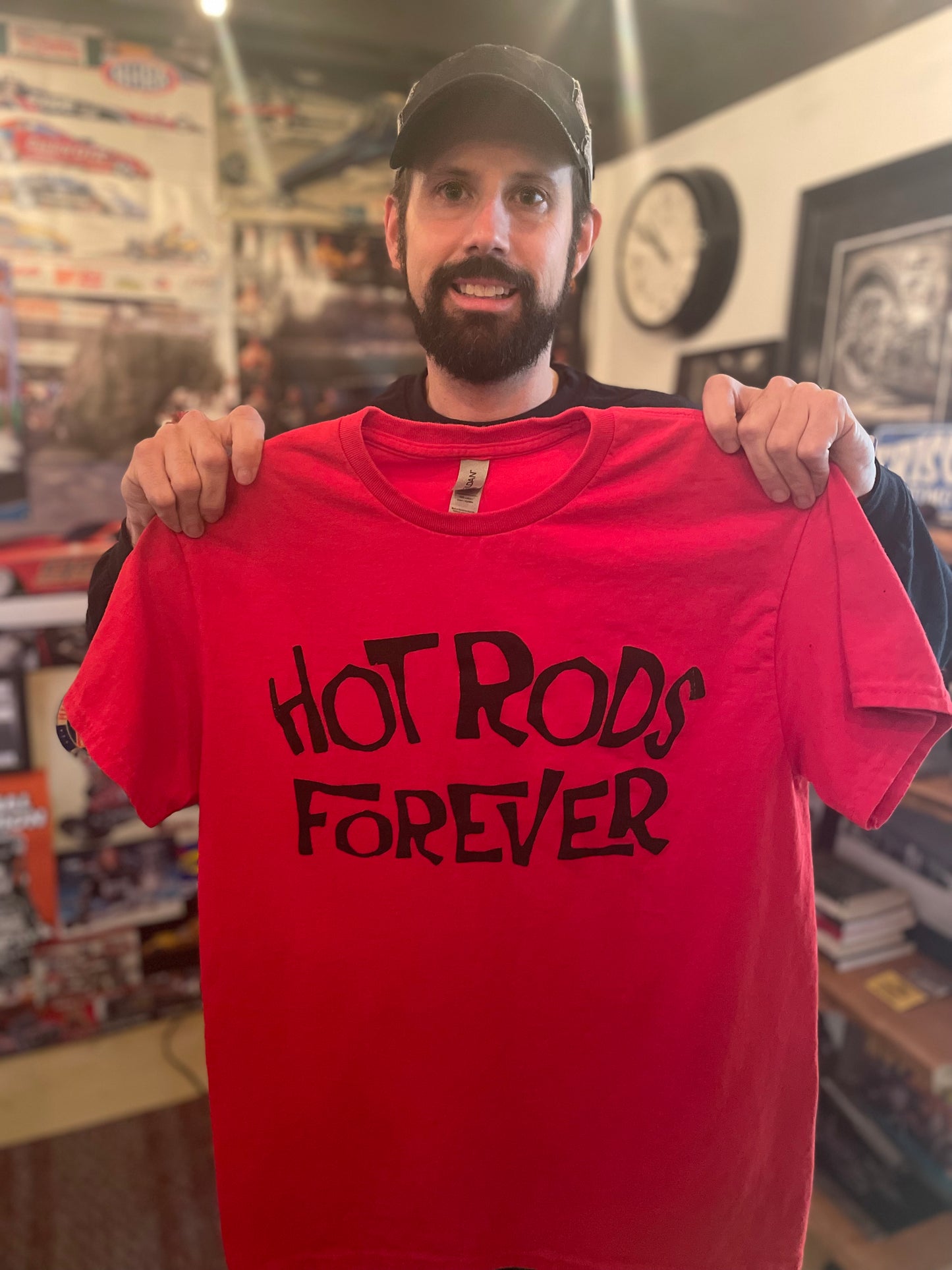 Rod Shop Collective founder holding the Hot Rods Forever t-shirt — hand-lettered red tee — The OG Collection by Rod Shop Collective — Louisville, Kentucky