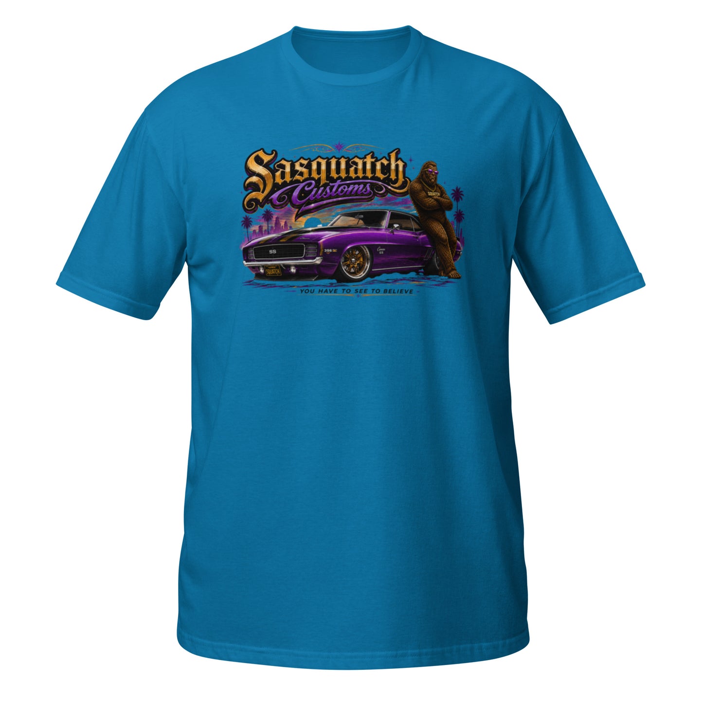 Sasquatch Customs Muscle Car Collection t-shirt — Bigfoot leaning on a purple 1969 Camaro pro-touring build on Forgeline billet wheels in front of a city skyline with arms crossed — funny Sasquatch muscle car tee on blue — Rod Shop Collective