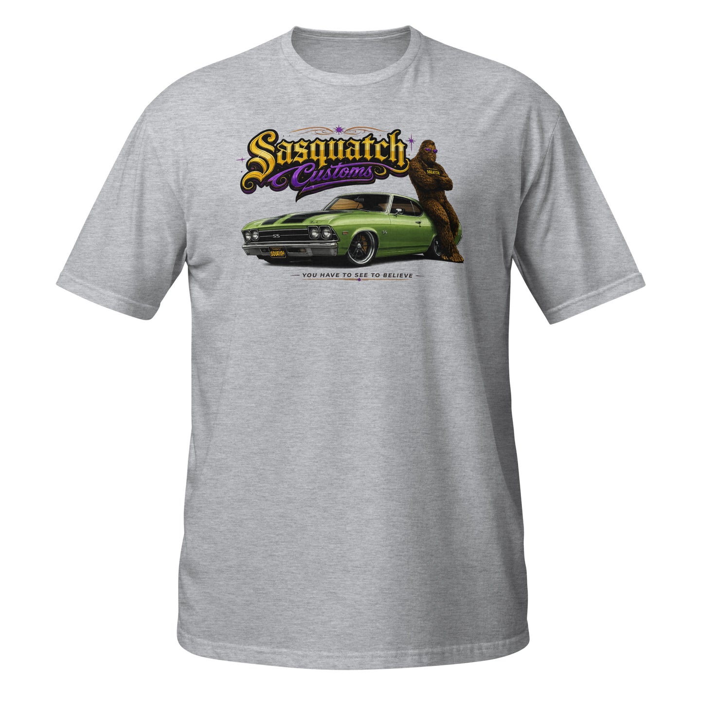 Sasquatch Customs Muscle Car Collection t-shirt — Bigfoot leaning on a green 1970 Chevelle SS pro-touring build with black SS stripes and arms crossed — funny Sasquatch muscle car tee on gray — Rod Shop Collective
