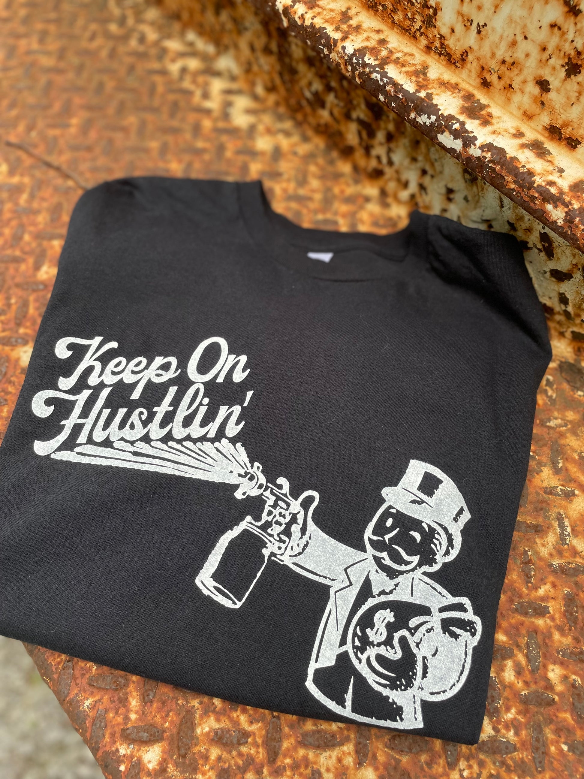 Keep On Hustlin’ Money Bags graphic t-shirt for hustle and streetwear apparel